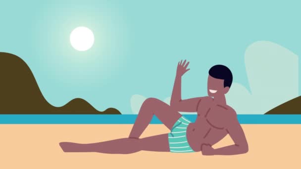 Afro мужчина отдыхающий на пляже — стоковое видео