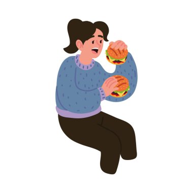 İki hamburger yiyen kadın.