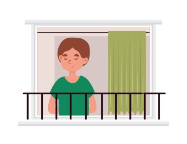 Erkek pencereden bakıyor.