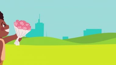 Afro anne ve oğlu çiçekleri canlandırıyor.