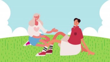 Kampta oturan genç çift.