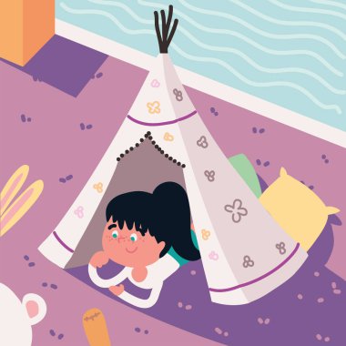 Mutlu kız çadırda oynuyor.