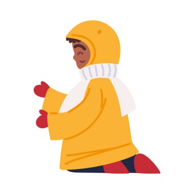 Kış için paltosu ve atkısı olan çocuk.