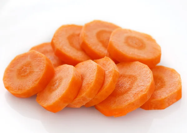 Sliced carrots on white — Stock Photo, Image