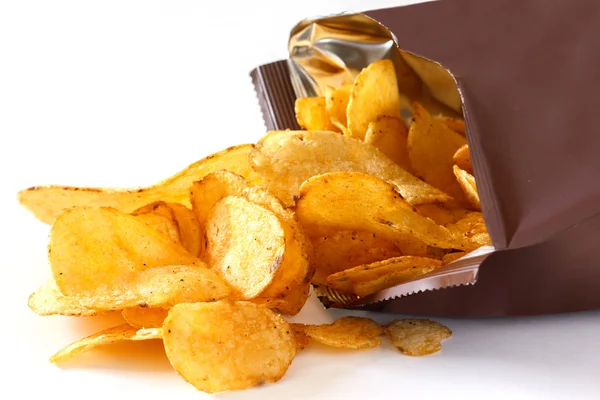 Open packet of crisps on white — Stock Photo, Image