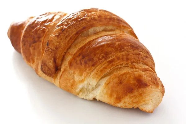 Single crispy croissant — Stock Photo, Image