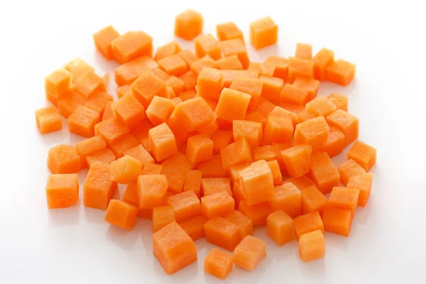 Diced carrots on white — Stock Photo, Image