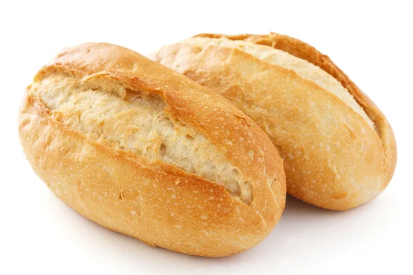 Two crusty mini baguettes on white surface — Stock Photo, Image