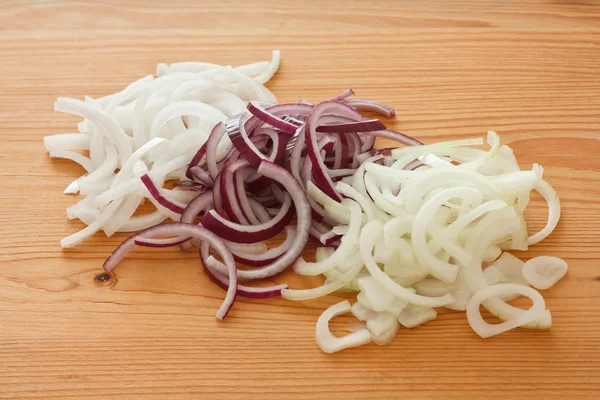 White, red and yellow onion rings — Stock Photo, Image