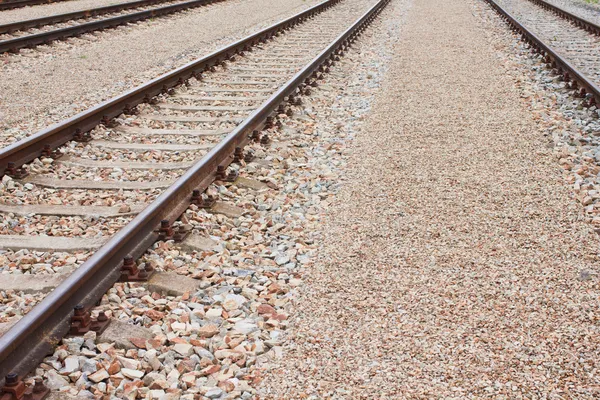 Newly laid train tracks on concrete ballasts — Stock Photo, Image