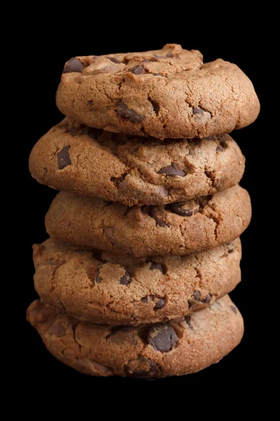 Stack of chocolate chip cookies isolated on black. — Stock Photo, Image