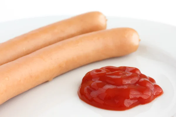 Dva frankfurtské párky na desku s kečupem — Stock fotografie