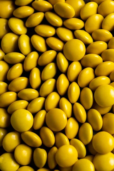Amarillo Caramelo Recubierto Chocolate Botón Espolvorear Textura Smarties Espolvorea —  Fotos de Stock