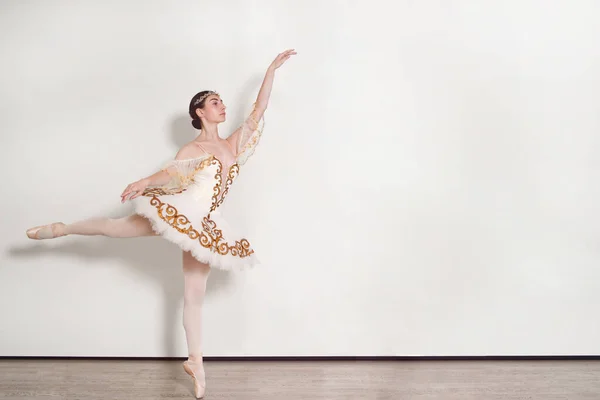 Pretty Ballerina Performs Ballet Exercises Studio White Background — Stockfoto
