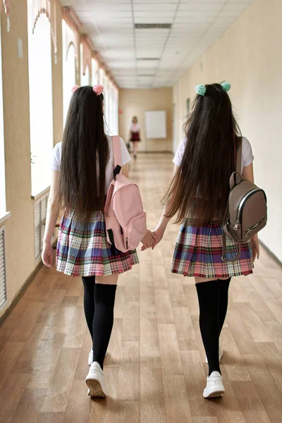 High school student is walking down the corridor of the school. Anime style — Stock Photo, Image