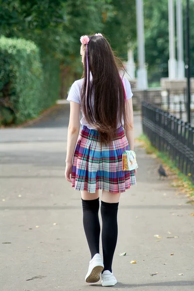 Asian high school girl on a walk. — Stock Photo, Image