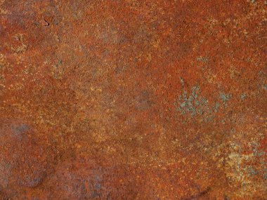 Yıpranmış renkleri ve paslı turuncu metal plaka. Aşınma. Oksitlenmiş renkli desenli yüzey. Birden fazla kullanım için soyut grunge paslı metalik arkaplan.