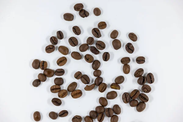 Many Brown Coffee Beans Photographed White Background Studio Shot Caffeinated — Stock Photo, Image
