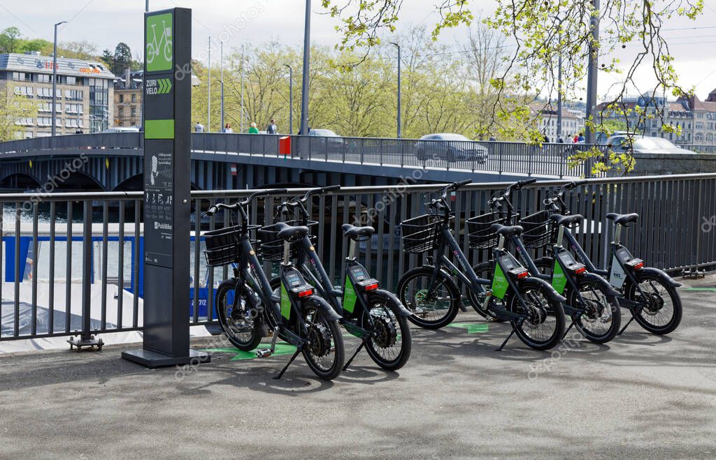 04.25.2019 zurich switzerland city, central area: green black e-bikes zri velos for customers who need short term transportation, environmentally friendly and healthy, daytime