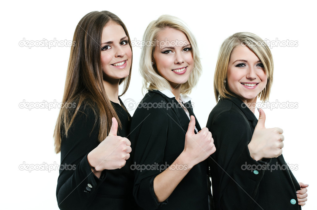 Three women giving thumbs up