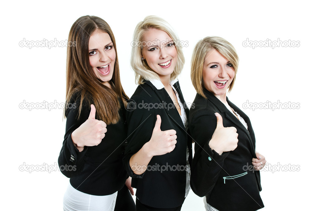 Three women giving thumbs up