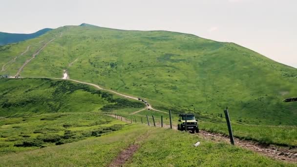 Offroad car rides through the mountains. Ukrainian Carpathian Mountains. Bright nature panorama view. Safari and travel — Stock Video
