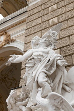 Stone sculpture or statue on facade of build. Odessa Opera Theater. Ukraine.