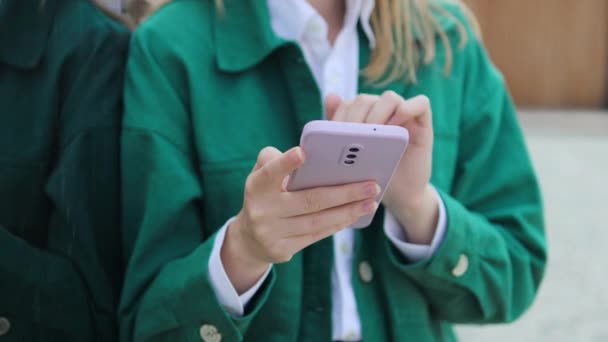 Close Womans Hands Green Jacket Holding New Smartphone Typing Message — Stock Video