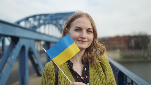 War Ukraine Young Woman Holding National Flag Ukraine Her Head — Video
