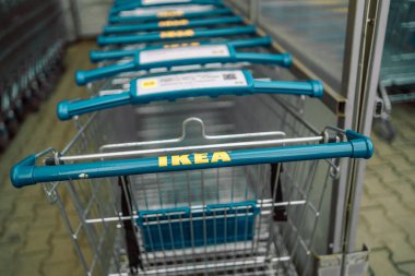 Krakow, Poland - April 26, 2022: ikea trolleys. IKEA is the worlds largest furniture retailer and sells ready to assemble furniture. Founded in Sweden in 1943. High quality photo