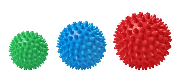 Bolas de masaje espinosas multicolores aisladas en blanco. Concepto de fisioterapia o fitness. Primer plano de una bola de goma colorida para dientes de perro sobre un fondo de color blanco. Modelo de virus Corona —  Fotos de Stock