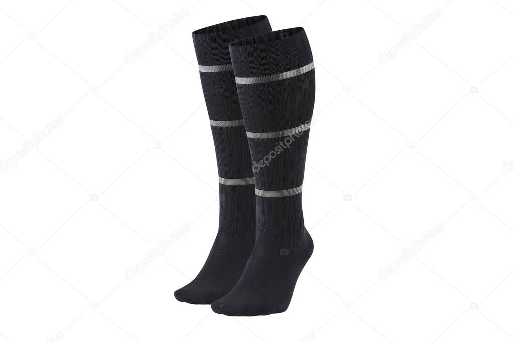 Black color socks isolated on white background. One pair of socks. Set of black socks for sports on foot as mock up for advertising, branding, design mockup, isolated, clipping path