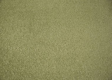 Ofis içi yeşil halı dokusu. Yüksek çözünürlüklü tek renk yün kumaş arka plan. İç malzeme arka plan görünümü. Kısa öbek halı. Boş jenerik mikrofiber kumaş dokusu