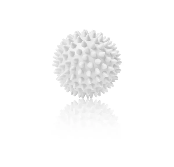 Witte plastic stekelige massagebal geïsoleerd op wit. Concept van fysiotherapie of fitness. Close-up van een kleurrijke rubberen bal voor hond tanden op een witte achtergrond. Corona virus model — Stockfoto