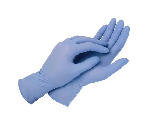 Lékařské rukavice.Dvě modré chirurgické rukavice izolované na bílém pozadí s rukama. Výroba gumových rukavic, lidská ruka má latexovou rukavici. Doktor nebo zdravotní sestra si nasazují ochranné rukavice — Stock fotografie