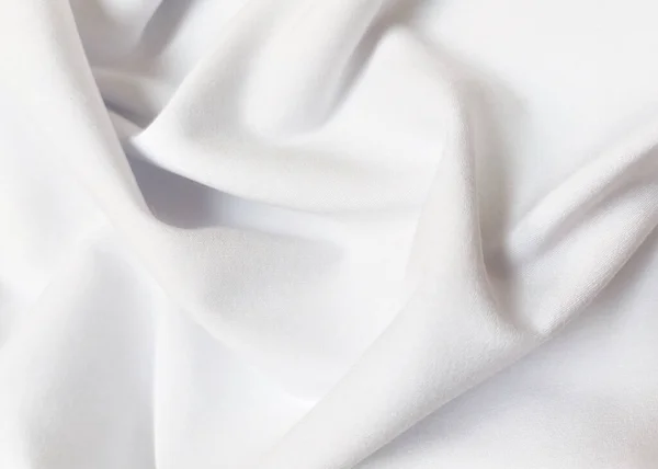 abstract background. White cloth with soft waves. Texture and pattern.  Smooth elegant white silk or satin luxury cloth. White silver fabric silk  background with beautiful soft blur and wave. 4456247 Stock Photo