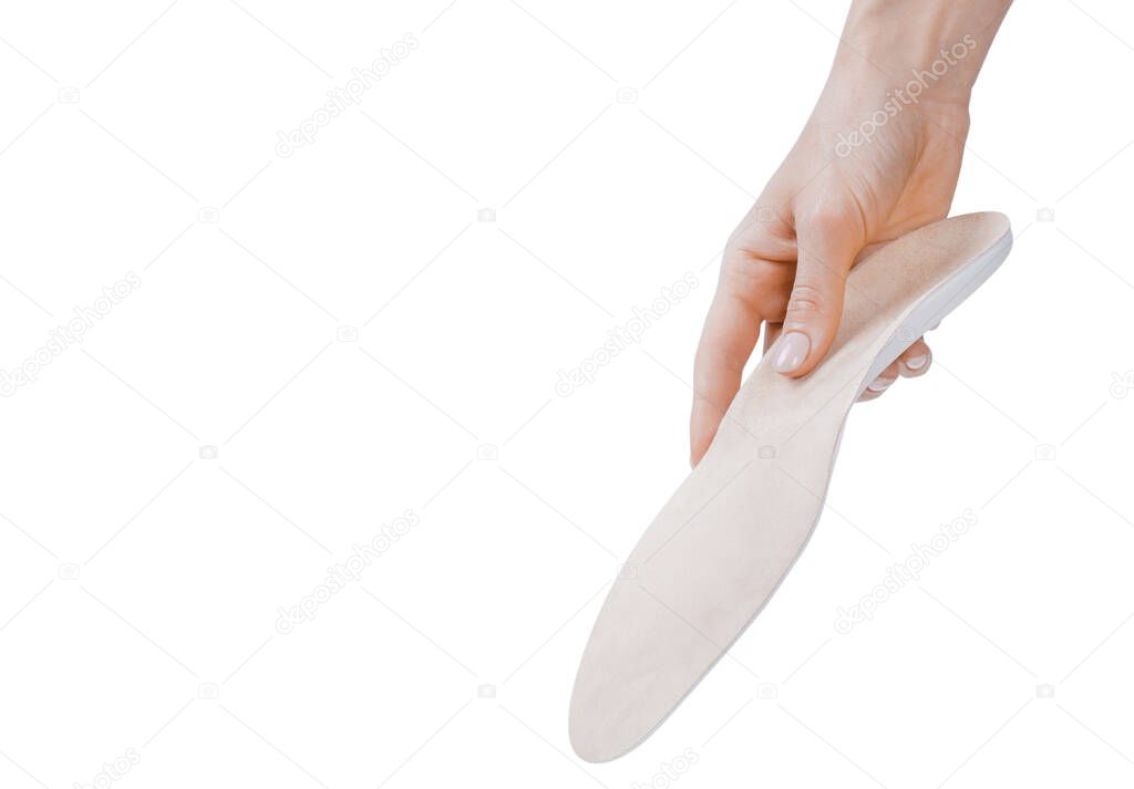 Orthopedic insole isolated on a white background. Medical insoles. Treatment and prevention of flat feet and foot diseases. Foot care, feet comfort. Wear comfortable shoes. Flat Feet Correction