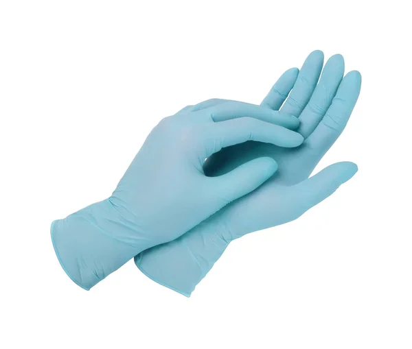 Guanti medici. Due guanti chirurgici blu isolati su sfondo bianco con le mani. Produzione di guanti di gomma, la mano umana indossa un guanto di lattice. Medico o infermiere indossare guanti protettivi — Foto Stock