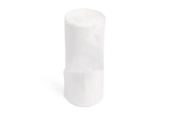 White polyethylene trash bag roll isolated on white background. Disposable packaging plastic garbage bags — Fotografia de Stock