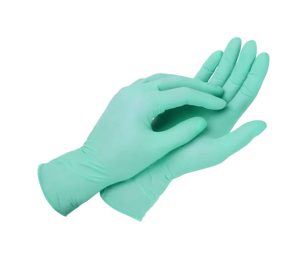 Lékařské rukavice. Dvě zelené chirurgické rukavice izolované na bílém pozadí s rukama. Výroba gumových rukavic, lidská ruka má latexovou rukavici. Doktor nebo zdravotní sestra si nasazují ochranné rukavice — Stock fotografie