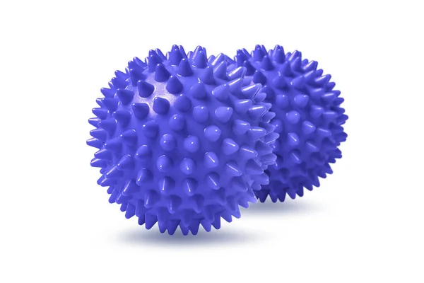 Dos bolas de masaje espinosas azules aisladas en blanco. Concepto de fisioterapia o fitness. Primer plano de una bola de goma colorida para dientes de perro sobre un fondo de color blanco. Modelo de virus Corona — Foto de Stock