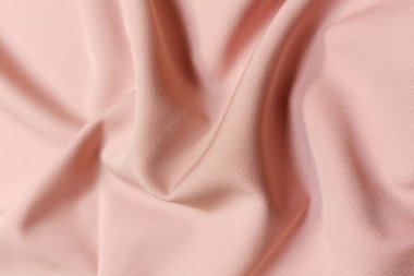 Pembe buruşuk ya da dalgalı kumaş dokusu arka planı. Soyut keten kumaş yumuşak dalgalar. İpek atlası ya da streç Jacquard. Pürüzsüz lüks kumaş dokusu. Pankart veya reklam kavramı