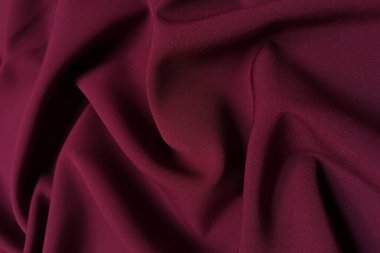 Pembe buruşuk ya da dalgalı kumaş dokusu arka planı. Soyut keten kumaş yumuşak dalgalar. İpek atlası ya da streç Jacquard. Pürüzsüz lüks kumaş dokusu. Pankart veya reklam kavramı