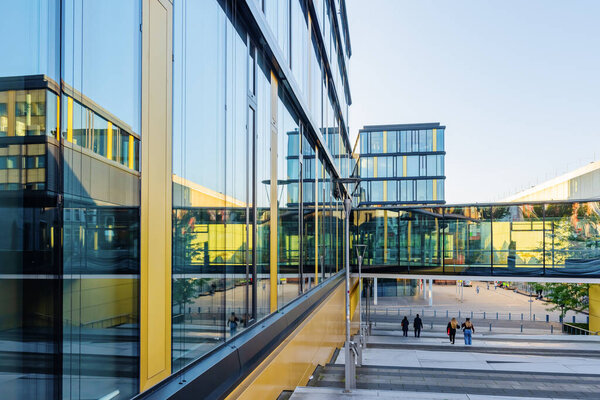 Aachen, NRW, Germany - October 09, 2021: modern building of AachenMnchener insurance at evening. AachenMnchener is part of the Generali AG, the second largest direct insurance company in Germany