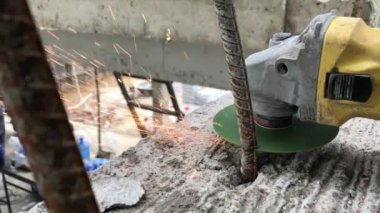 slow motion electric saw cutting steel