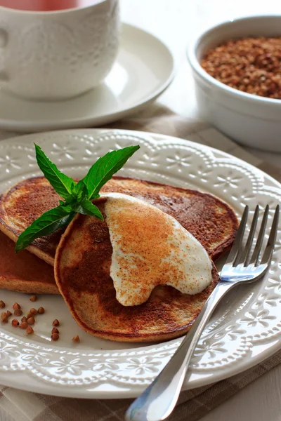 Buckwheat pancakes with banana — Stock Photo, Image