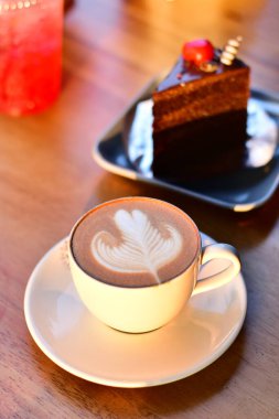 Coffee Cappuccino Art In Mug With A Relaxing Time.