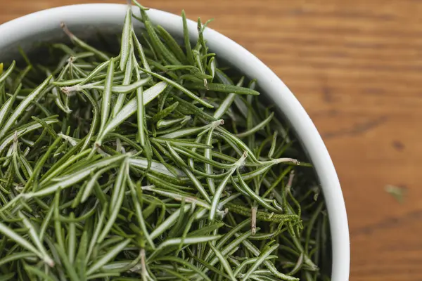 Bowl with rosemary — Stock Photo, Image