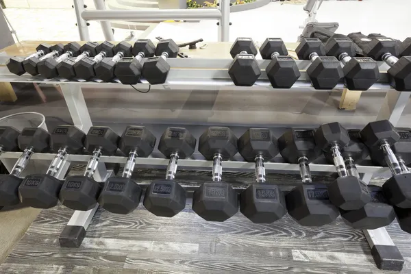 Dumbbell rack in gym — Stock Photo, Image