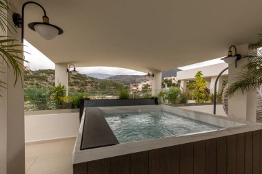 Hydromassage bathtub on the hotel terrace